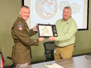 LTC Swoboda presents the PaYS plaque to Mr. Ellis, recognizing O'Reilly Auto Parts as a PaYS partner. LTC Swoboda presents the PaYS plaque to Mr. Ellis, recognizing O'Reilly Auto Parts as a PaYS partner.