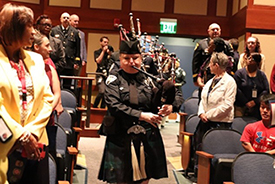 Bagpipe player at Patriot Day ceremony News Police Department