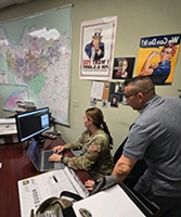 Roy Kidwell with SFC Corey Black as she registers for PaYS Roy Kidwell with SFC Corey Black as she registers for PaYS
