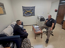 Roy Kidwell briefs Mark Pratt on Army PaYS at Lincoln University ROTC Roy Kidwell briefs Mark Pratt on Army PaYS at Lincoln University ROTC