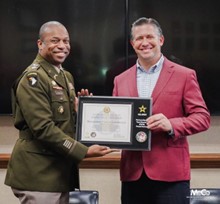 LTC Johnson presents plaque to Mayor Golden