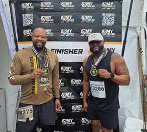 Antonio Johnson and Victor Fleming at the finish line