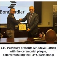 LTC Pawlosky presents Mr. Steve Patrick the ceremonial plaque