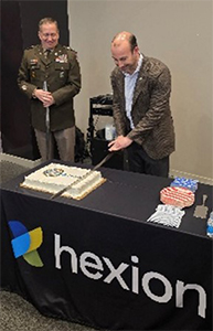 LTC Steiner and Mr. Lefenfeld cutting the ceremonial cake LTC Steiner and Mr. Lefenfeld cutting the ceremonial cake