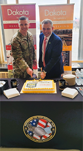 BG Johnson and Governor Armstrong cut the ceremonial cake BG Johnson and Governor Armstrong cut the ceremonial cake