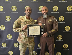 LTC Crosby presents plaque to Sheriff Jones LTC Crosby presents plaque to Sheriff Jones