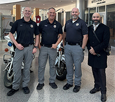 Michael Ruff, Jason Johnson, another officer and Alfredo Harris Michael Ruff, Jason Johnson, another officer and Alfredo Harris