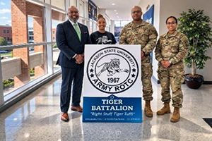 Samuel with Ms. Latasha Smith, ROO, MAJ  Simmons, PMS,  MAJ Martini Ford, and APMS Jackson St University Army ROTC