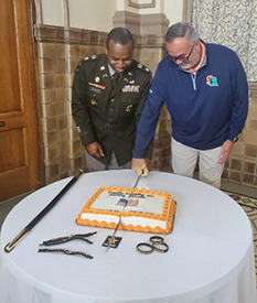 LTC Johnson and Mr. Grimes cut the ceremony cake. 