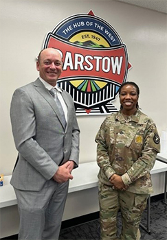 Matthew Green with SFC Patricia Wynter-Klutse, Station Commander, Army Recruiting Center in Barstow, CA