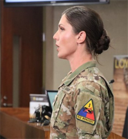Staff Sergeant Jessica Brust, 1st Armored Division Band performs the National Anthem
Staff Sergeant Jessica Brust, 1st Armored Division Band performs the National Anthem