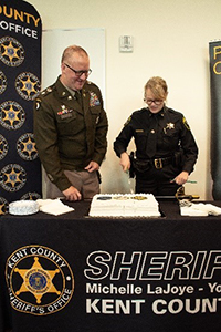 LTC McCart and Sheriff LaJoye-Young cut the ceremonial cake LTC McCart and Sheriff LaJoye-Young cut the ceremonial cake
