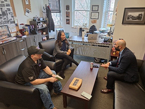 UW Recruiting Operations Officer Mrs. Lisa Pirak, UW Executive Officer CPT Nathaniel Yantis, Alfredo Harris