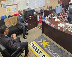 Marketing Analyst Frank McNeil and Senior Marketer Kevin Talley meet Transition Services Manager Ms. Shawanda Jackson